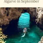 A Pinterest pin featuring Benagil Cave, a popular tourist destination in Algarve, Portugal. The image shows a boat sailing through a natural arch in the cave, surrounded by crystal-clear blue water. The text reads 