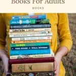 a pin with a girl carrying books. Adventure Fiction Books For Adults