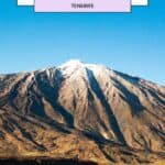 an image of a mountain with snow on top with the blue sky at the back