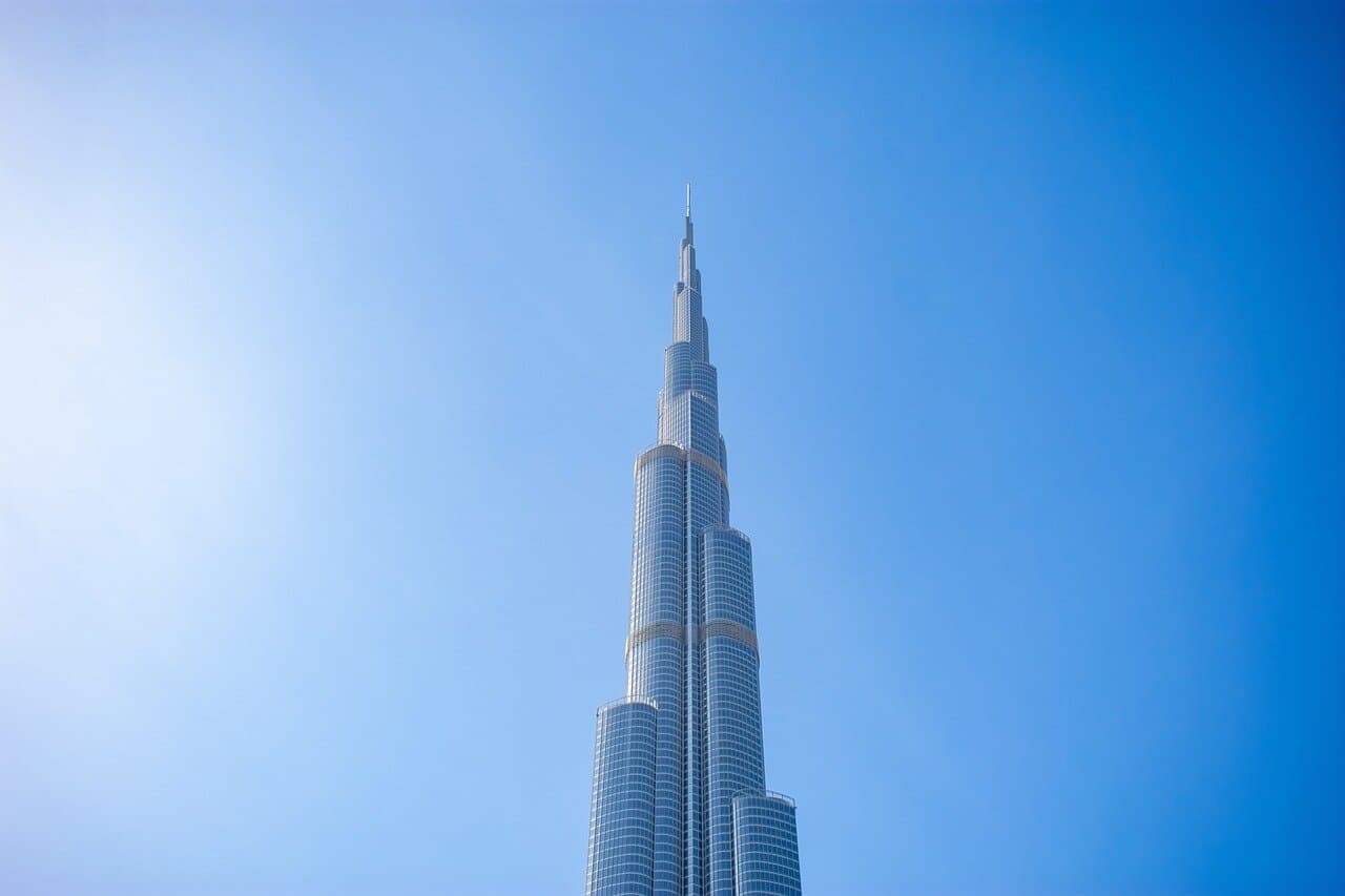 top part of the burj khalifa with the clear blue sky