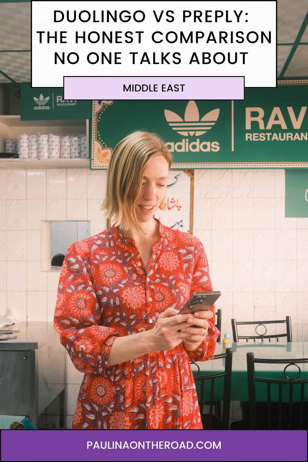 a woman looking at her phone in a restaurant
